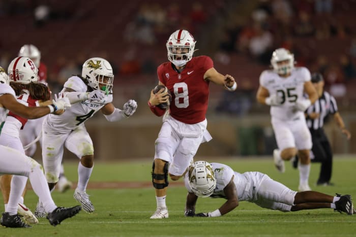 Sep 16, 2023; Stanford, California, USA; Stanford Cardinal quarterback Justin Lamson (8) scrambles with the ball past Sacramento State Hornets cornerback Dilon Juniel (3) during the fourth quarter at Stanford Stadium. Mandatory Credit: Sergio Estrada-USA TODAY Sports